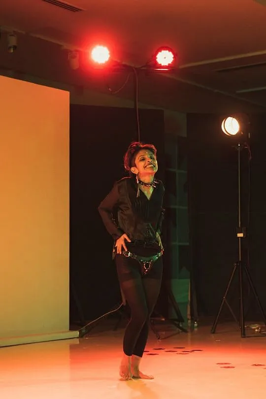An image of Oysh. Performance and the stage became vital spaces for many queer folx to explore and express their identities in ways that daily life might not allow. 